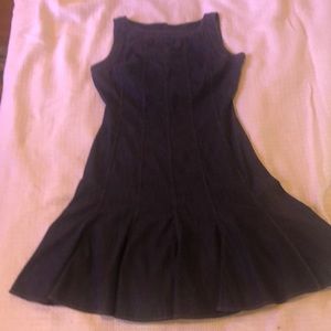 Dark denim dress with stitching detail. Flattering and flirty.